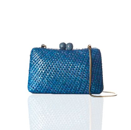 Knitted blue bag with pendants